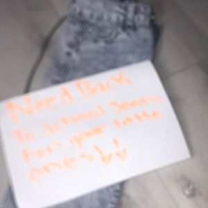 Jeans that are mixture of dark blue and light blue